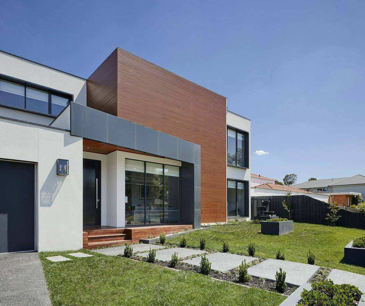 Home exterior with a sold sign