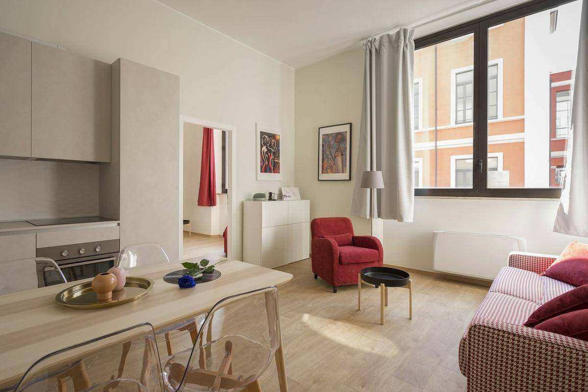 Living room opening to a terrace
